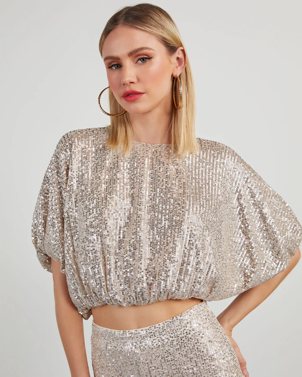 Diva Sequin Bubble Hem Top