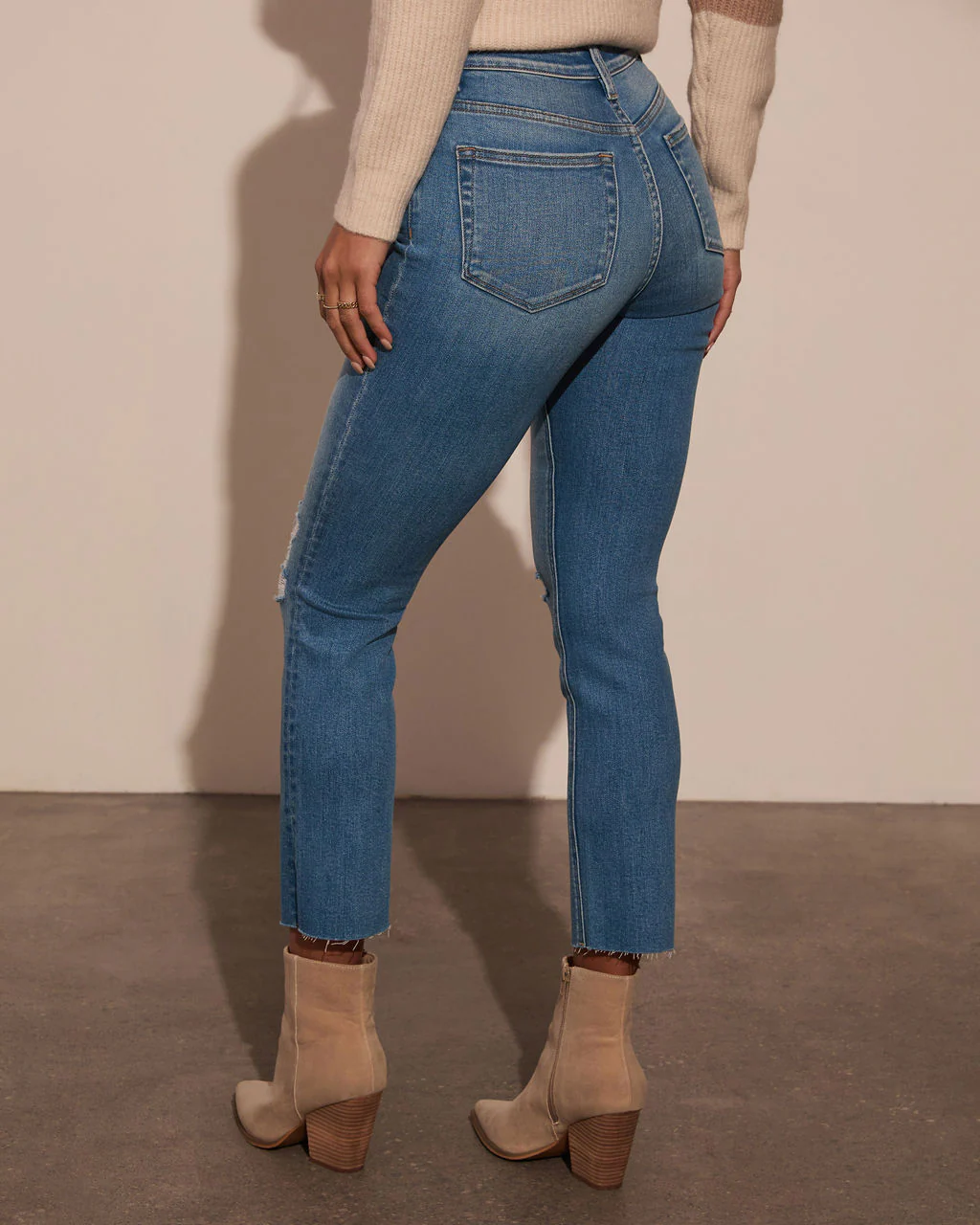 Jeanne High Rise Distressed Slim Straight Denim