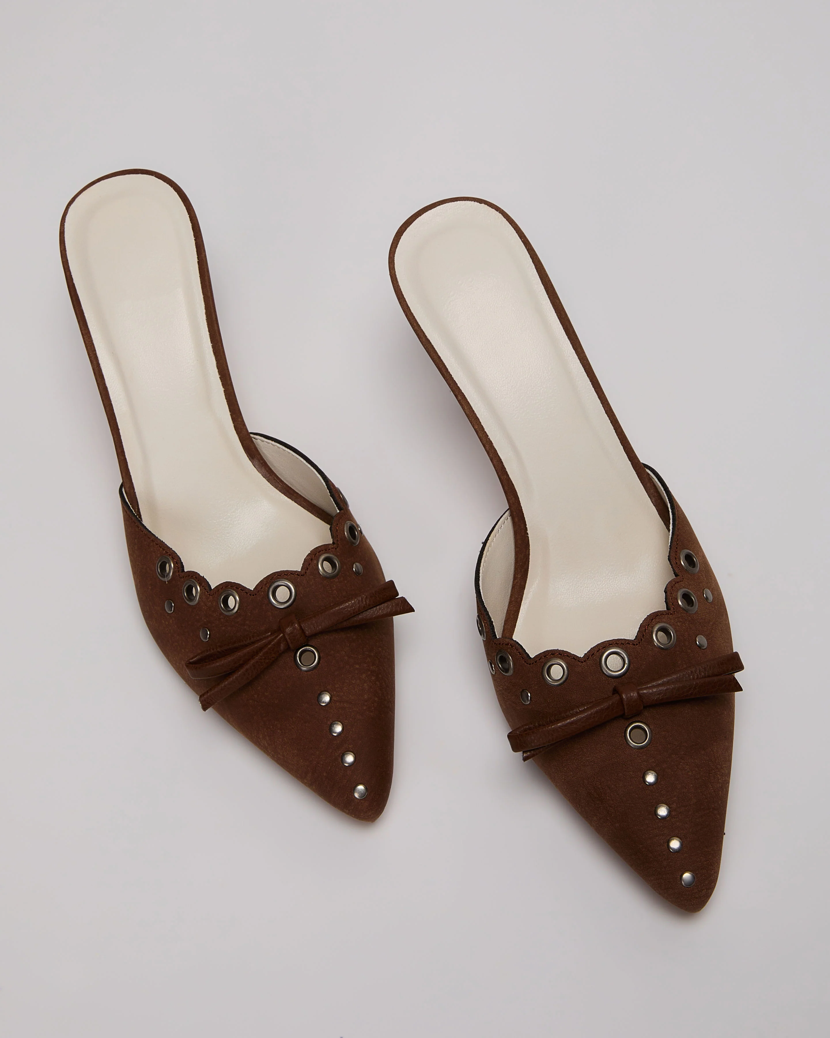 Mara Grommet and Bow Pointed Toe Mules