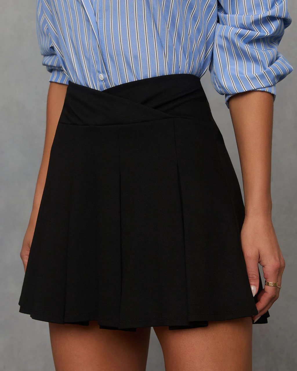 Power Play Pleated Mini Skirt