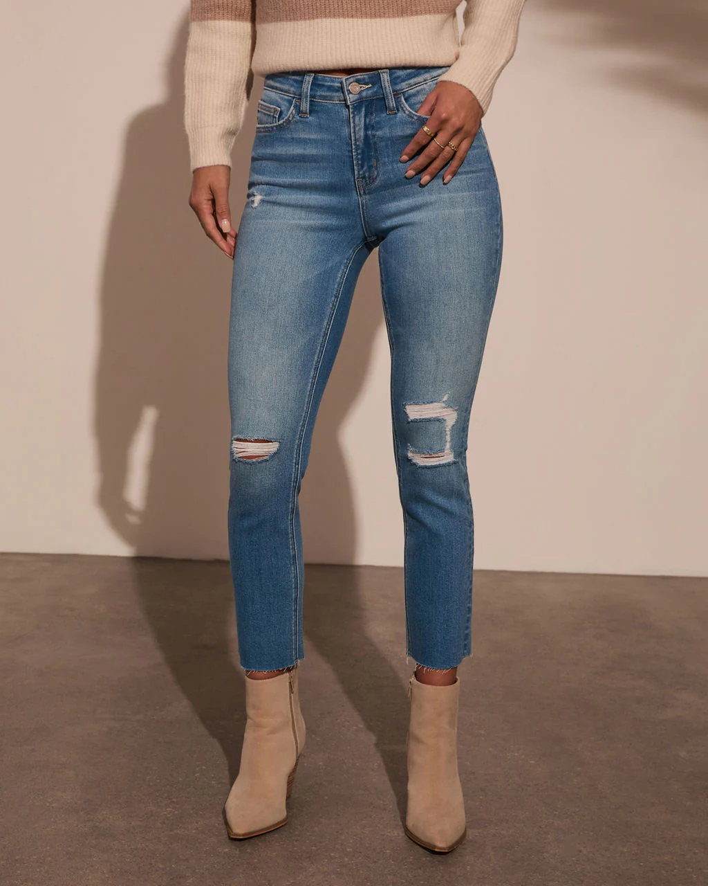 Jeanne High Rise Distressed Slim Straight Denim