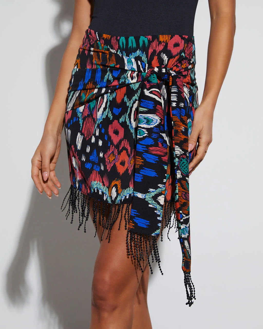 Isla Wrap Fringe Hem Mini Skirt