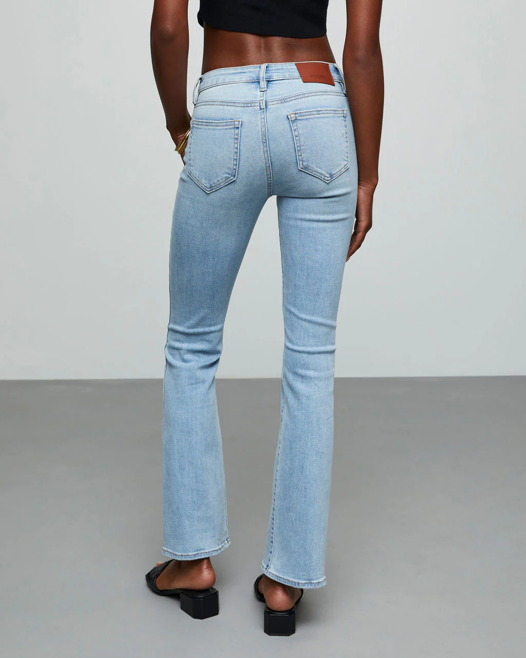 Matira High Rise Distressed Flare Jeans