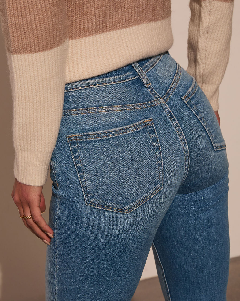 Jeanne High Rise Distressed Slim Straight Denim