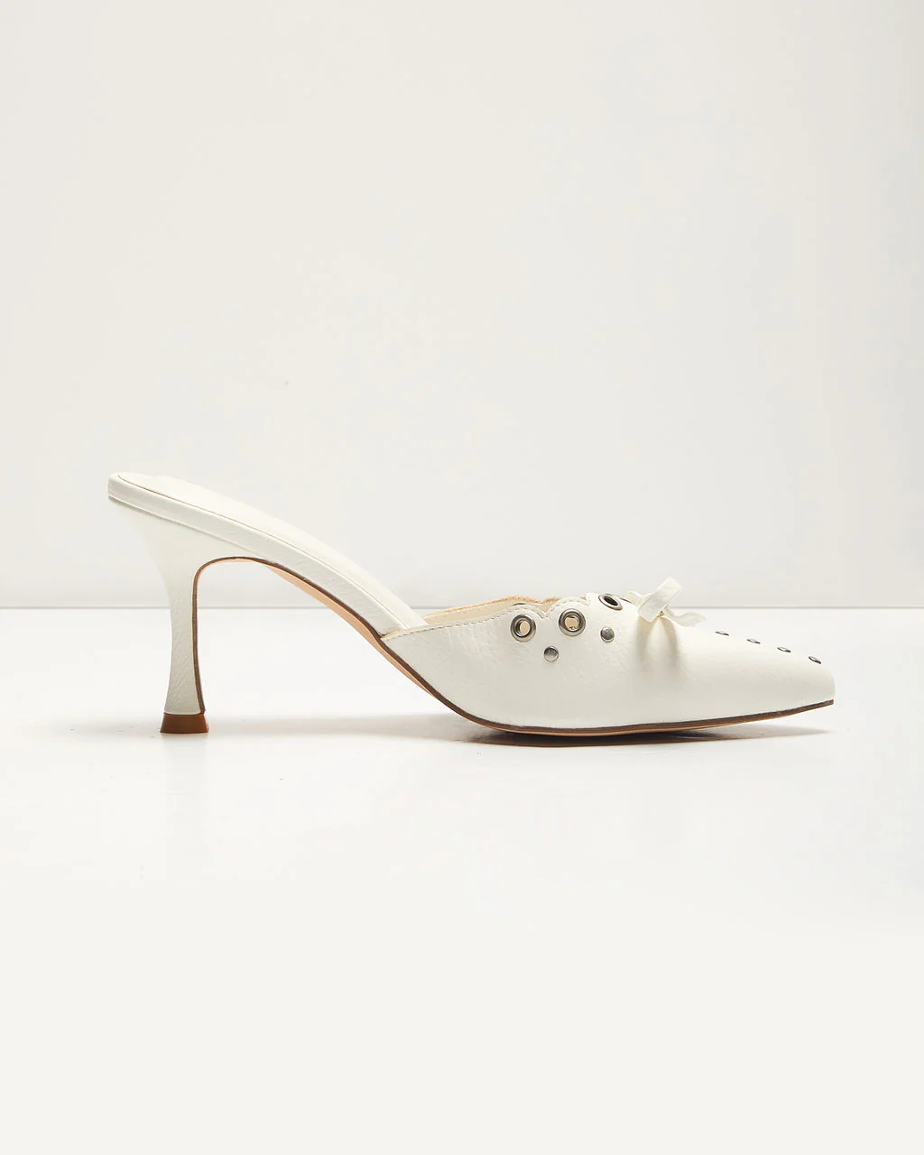 Mara Grommet and Bow Pointed Toe Mules